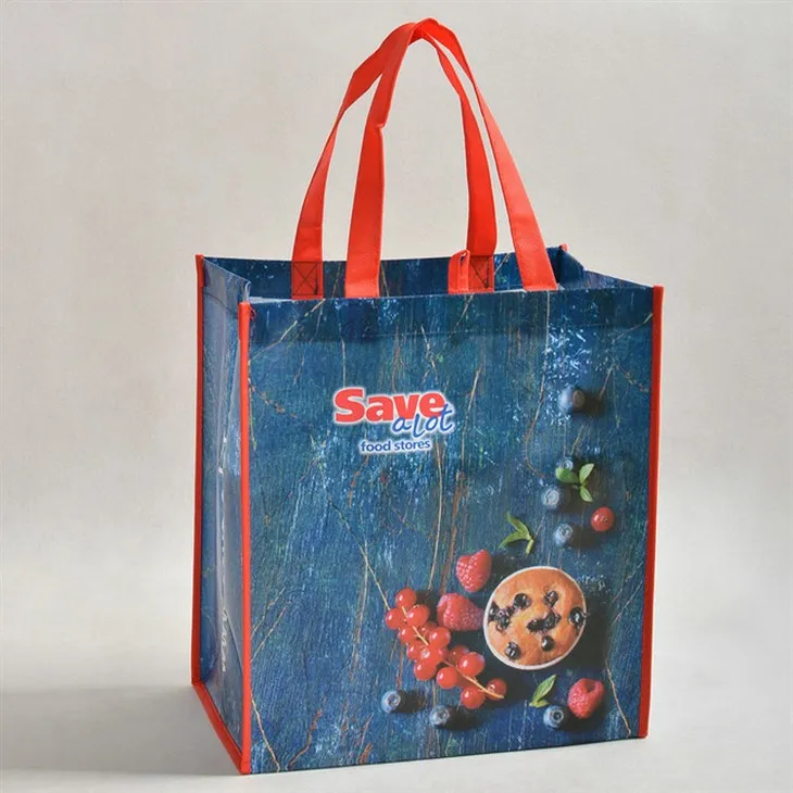 Laminoitu kudottu laukku